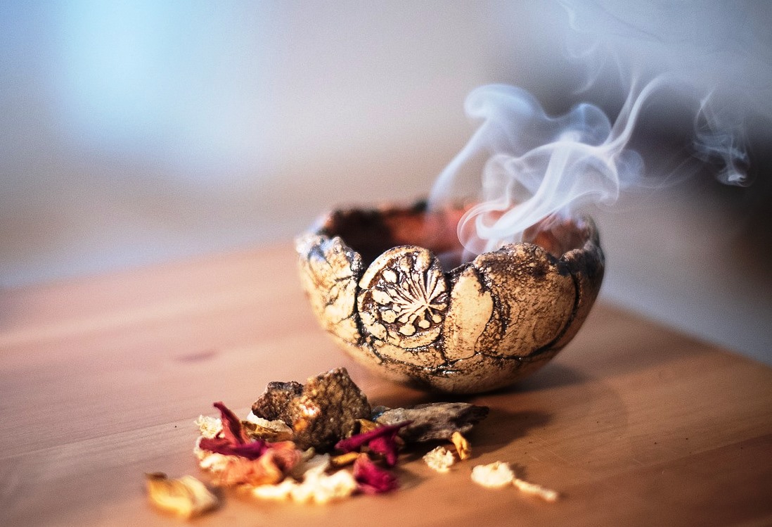 Woman holding a bright white light